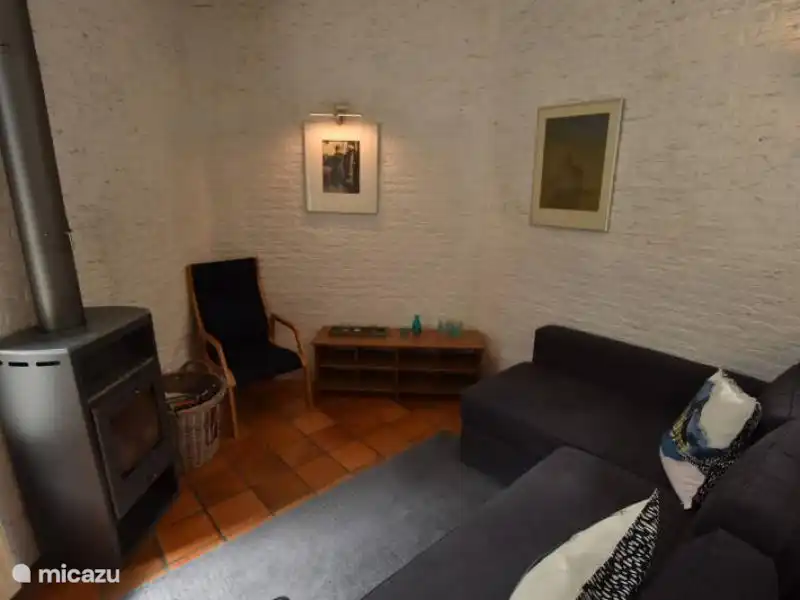 Sitting area with wood burning stove.