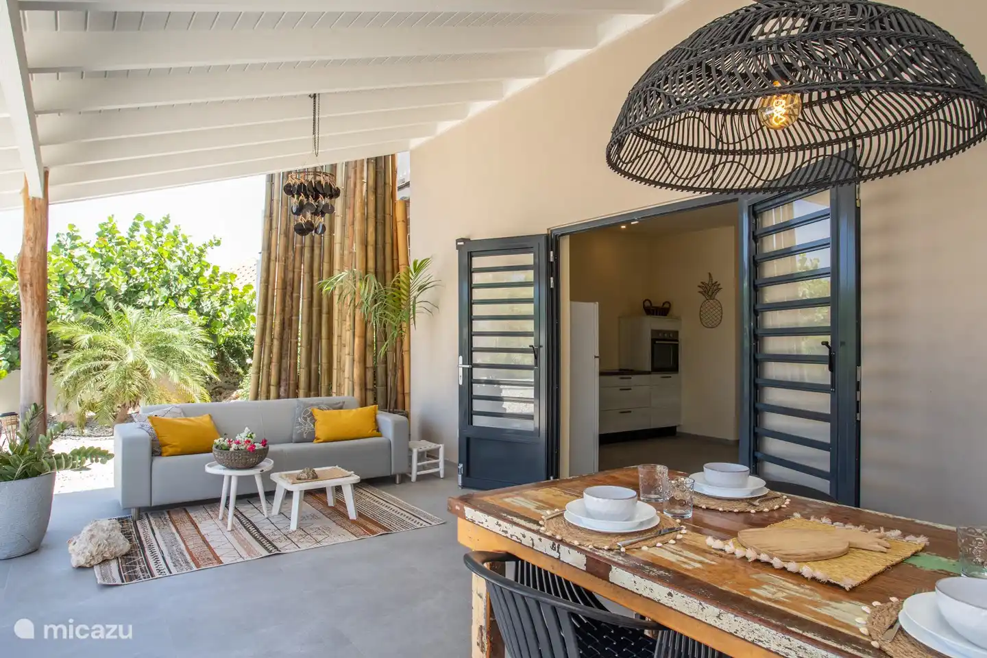 Atmospheric poch connects the house with the large private garden