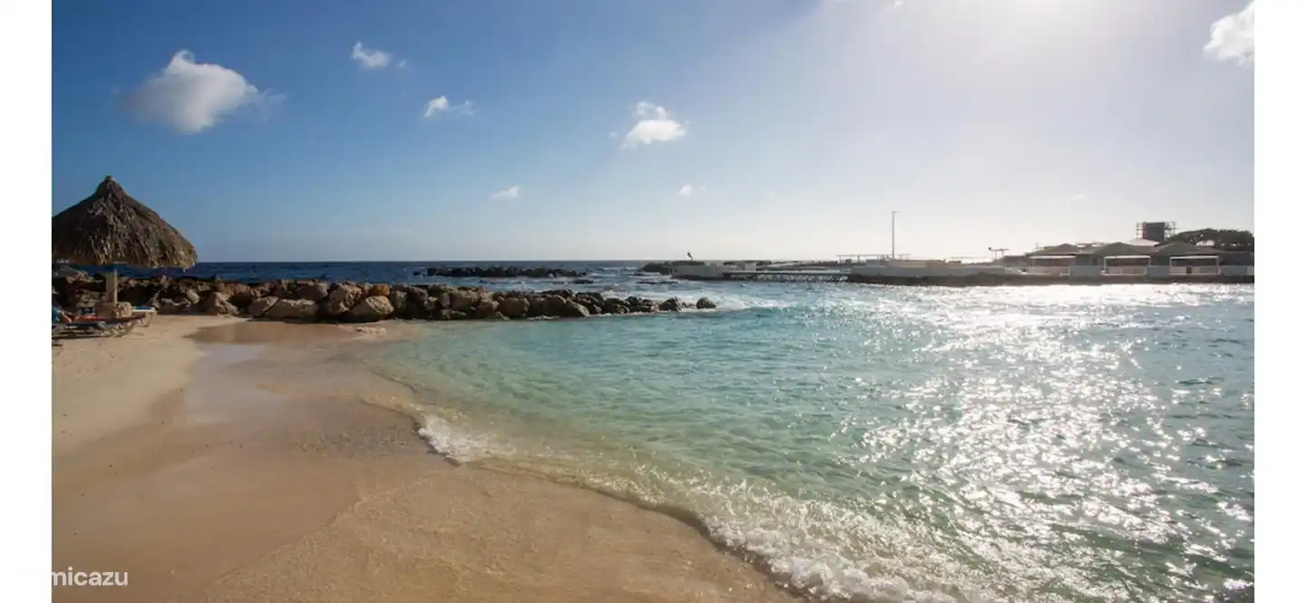 Private resort beach with free sunbeds