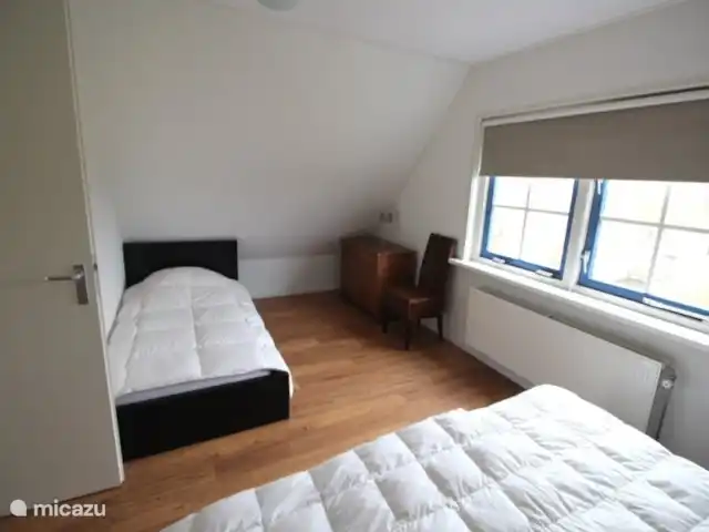 feliz en holanda en Países Bajos, Holanda del Norte, Schoorl - casa vacacional Cama individual en la trastienda