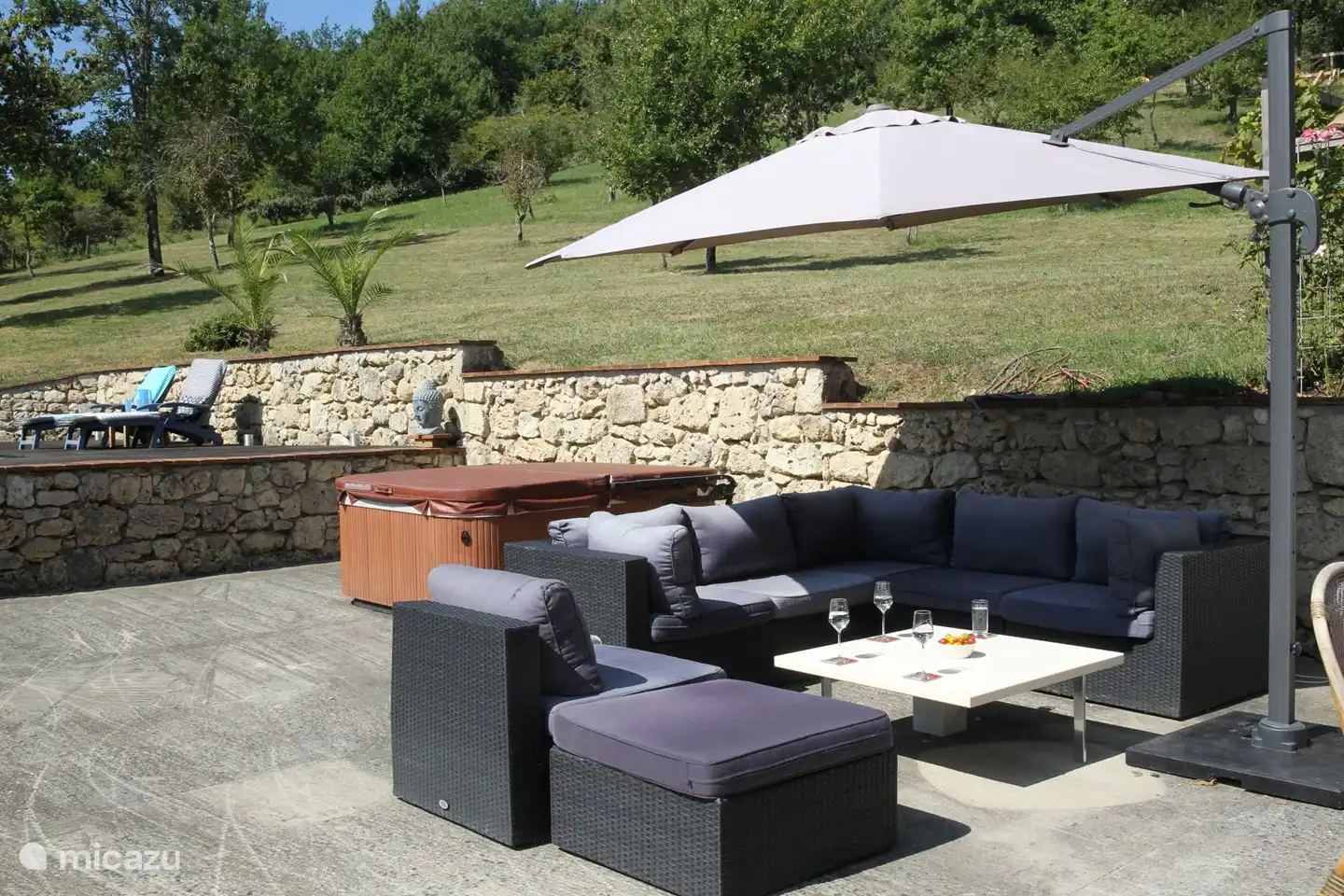 The terrace next to the house with lounge Panorama set and jacuzzi