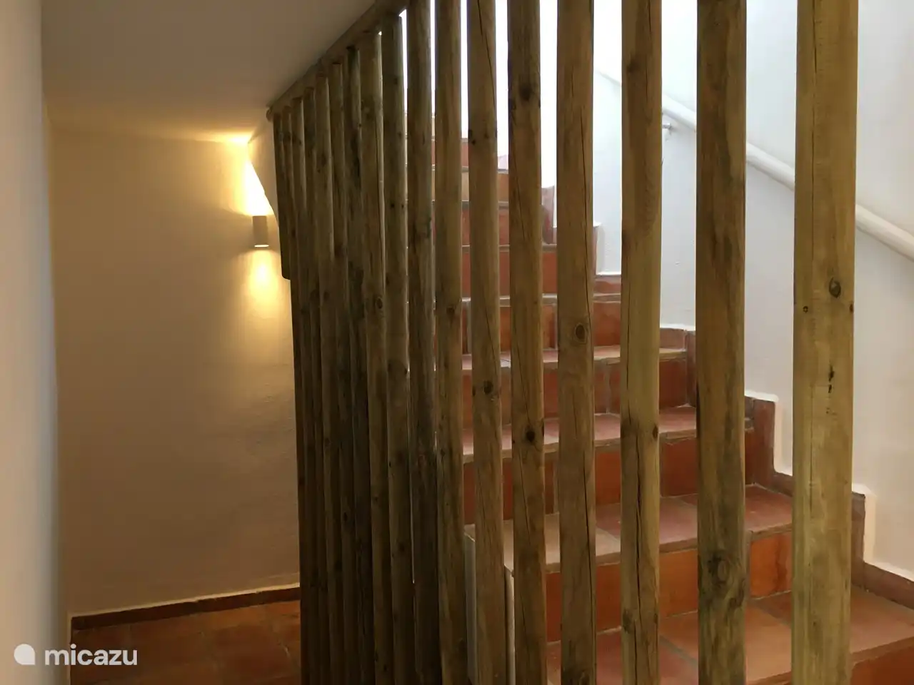 Trap naar de eerste etage.