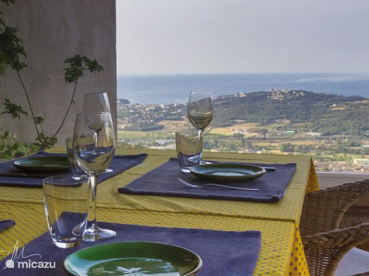 View from covered terrace by swimming pool