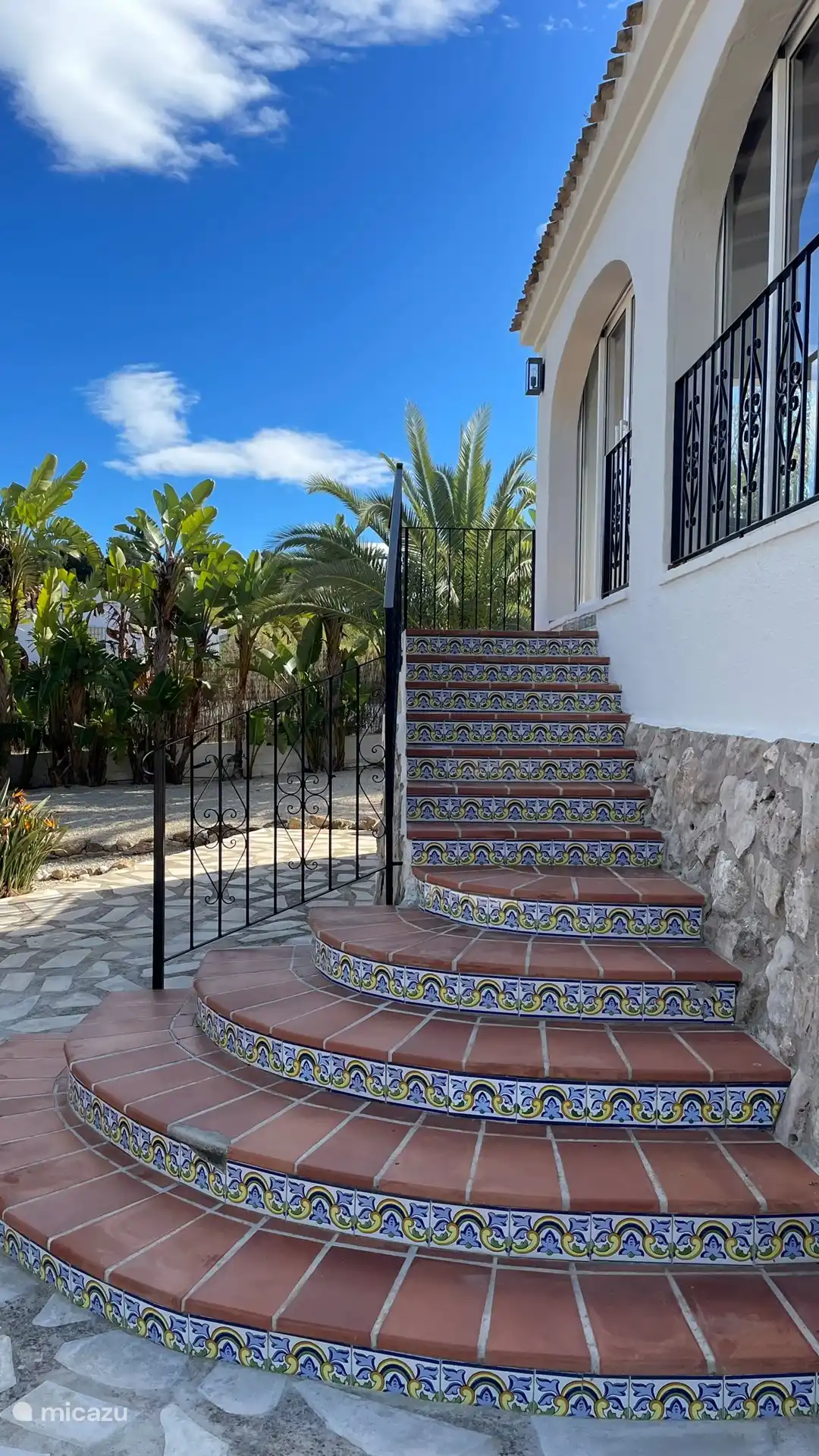 The stairs from the terrace to the garden room. The house is accessible at the rear with only three steps