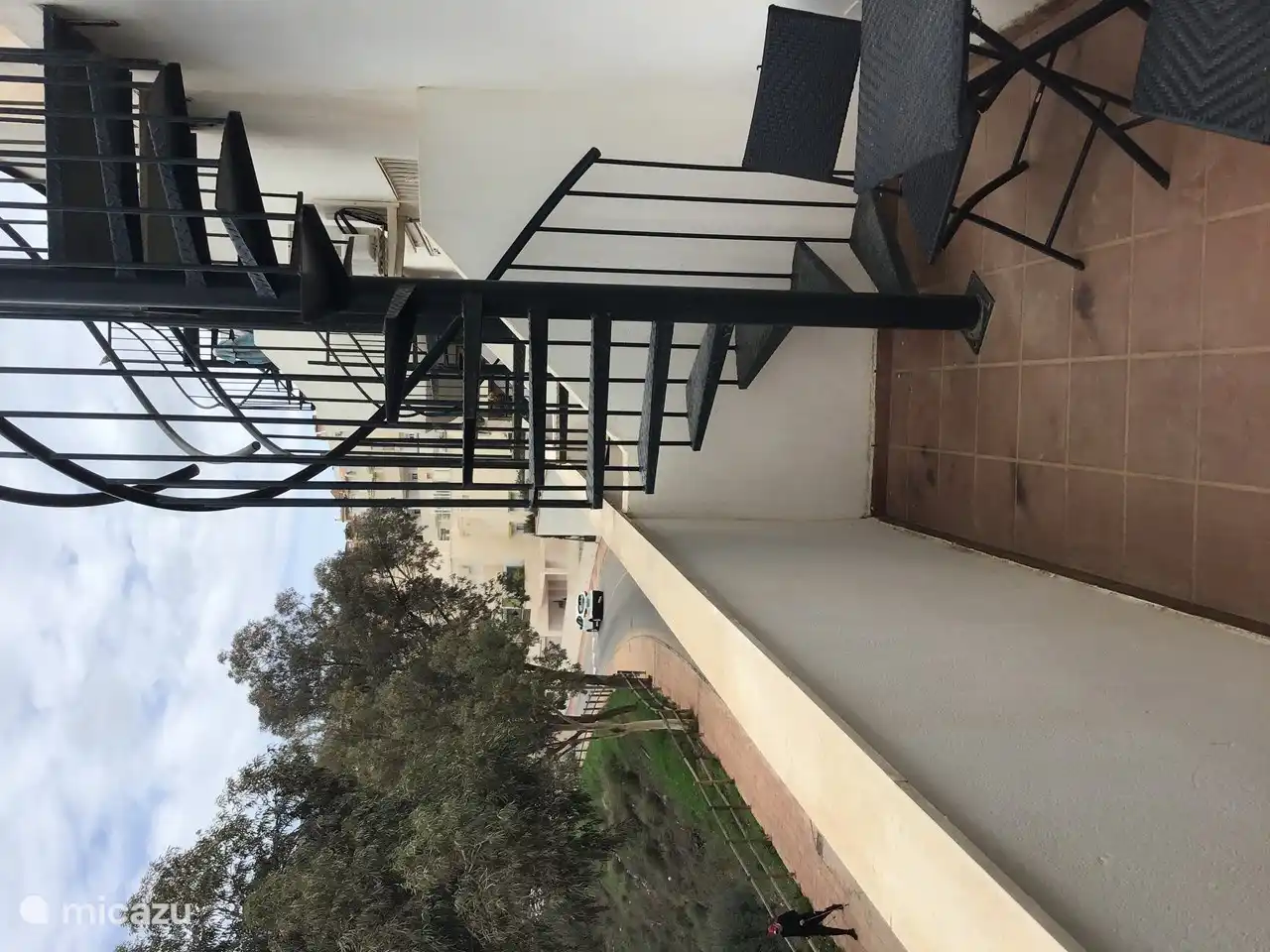 Spiral staircase from balcony to the terrace