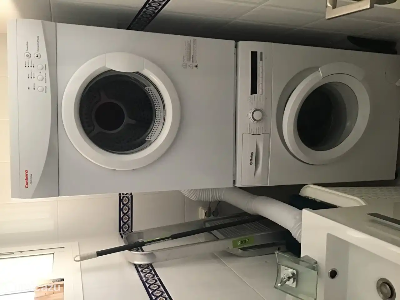 Room with washing machine and dryer