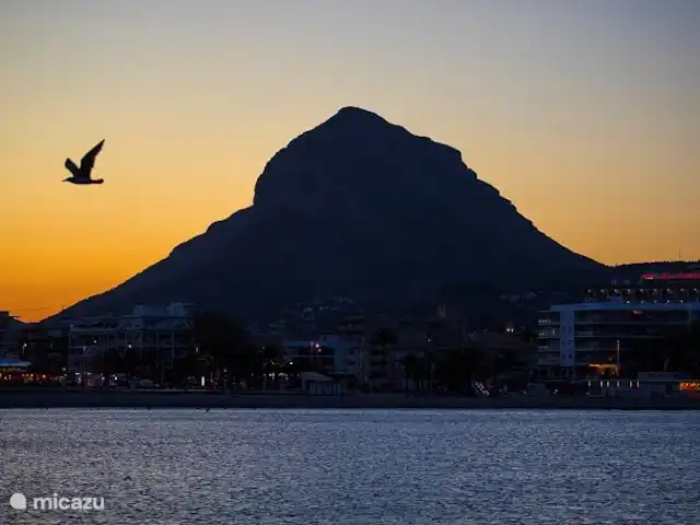 Hidden Villa Javea in Spain, Costa Blanca, Jávea - villa Montgo by night..