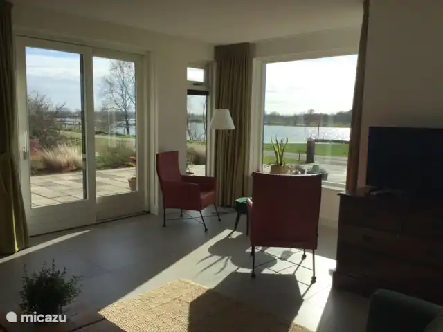 Location de Vacances Pays-Bas, Utrecht, Wijk bij Duurstede, maison de vacances - Lieu unique sur l'eau Vous avez des vues de la véranda sur 3 côtés. Un endroit merveilleux pour se détendre.