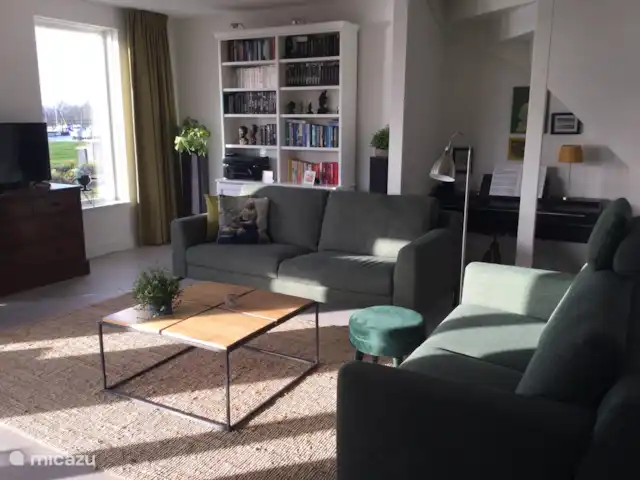 Location de Vacances Pays-Bas, Utrecht, Wijk bij Duurstede, maison de vacances - Lieu unique sur l'eau Depuis 2021, nous avons acheté 2 nouveaux canapés. Un 2 et 3 places. De cette façon, vous pouvez confortablement regarder au-dessus de l'eau et profiter de la vue