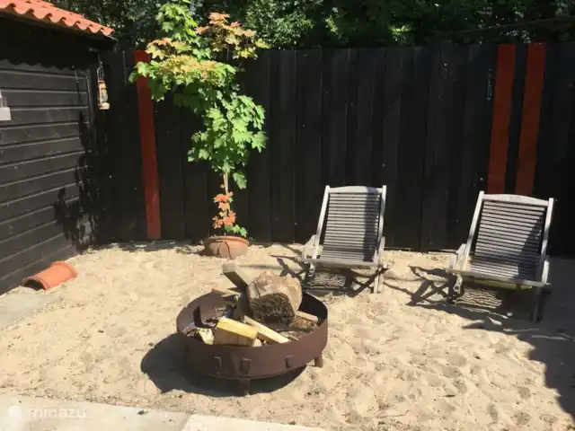 Location de Vacances Pays-Bas, Utrecht, Wijk bij Duurstede, maison de vacances - Lieu unique sur l'eau Plage privée dans le jardin avec un beau soleil l'après-midi et le soir