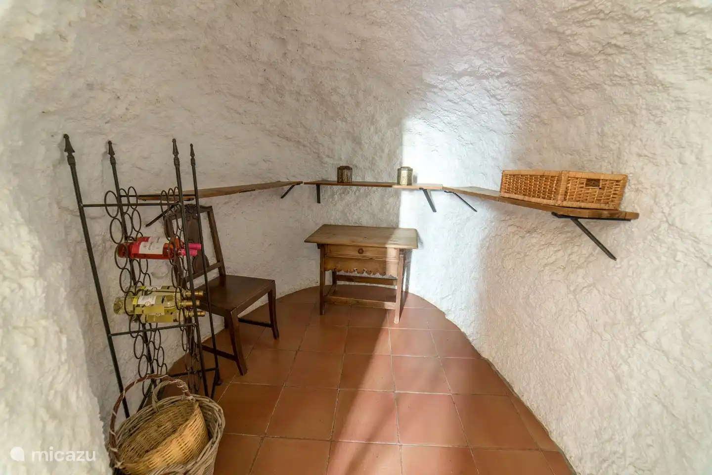 wine cellar, also to be used as a utility room.