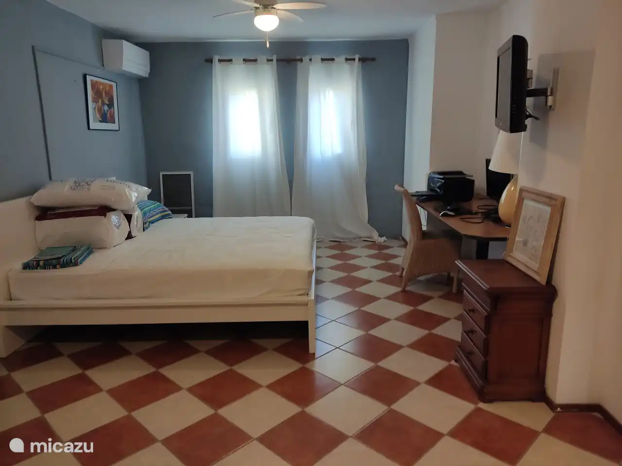 the extra bedroom with private bathroom in the basement with air conditioning for hot and cold!