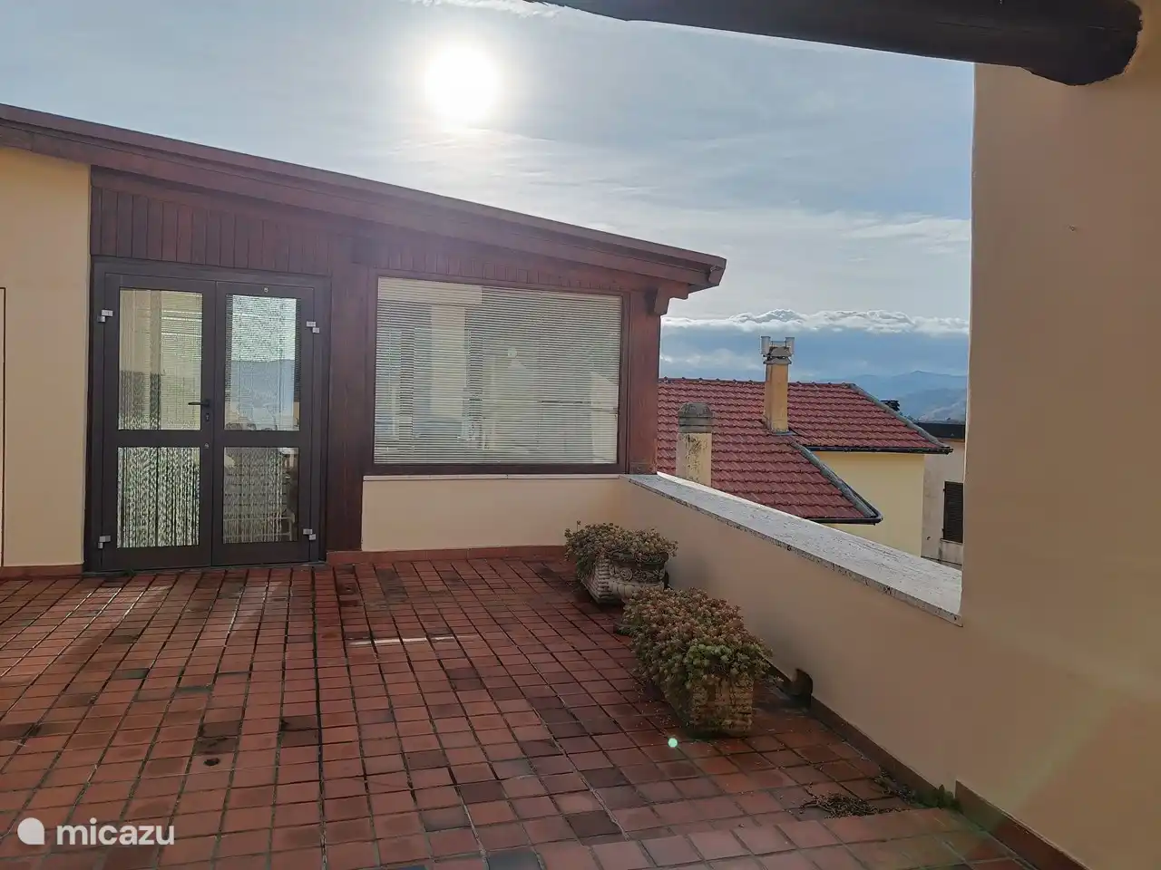 Der Wintergarten auf der großen Dachterrasse