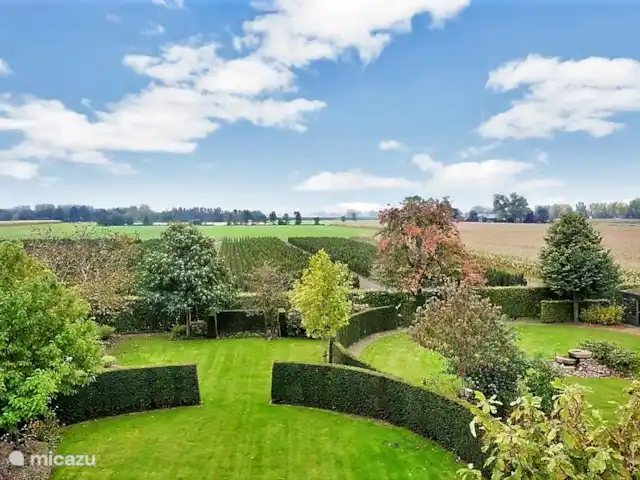 casa vacacional en Países Bajos, Barbante Septentrional, Kaatsheuvel – El mochuelo de Ketse Una foto general tomada desde arriba. Detrás del jardín (y también más en el área) mucho espacio en este paisaje agrícola.