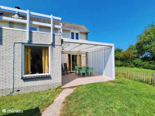 Korre 16 en Países Bajos, Holanda del Norte, Callantsoog - casa paredada Jardín