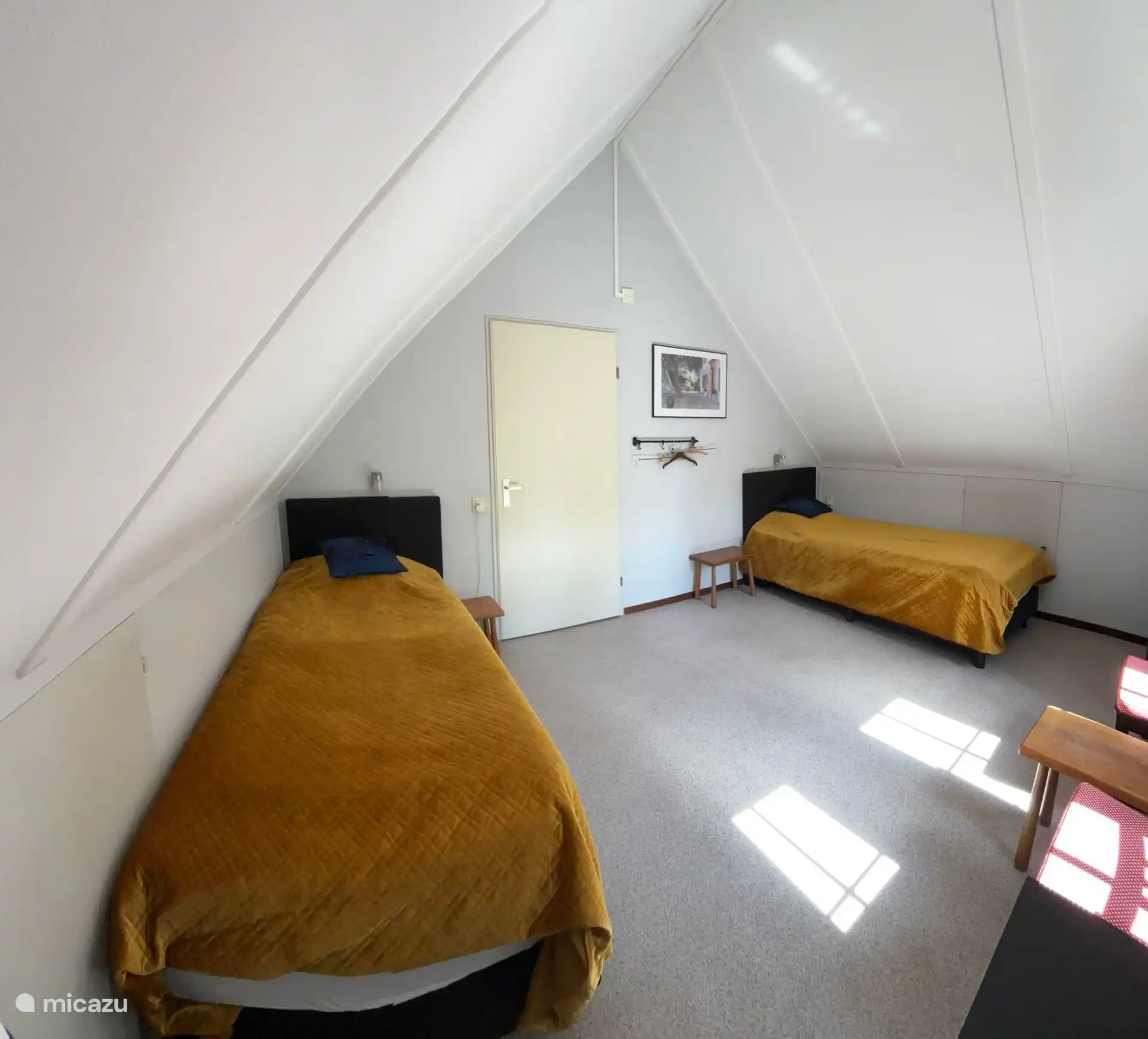 Bedroom with two single beds.