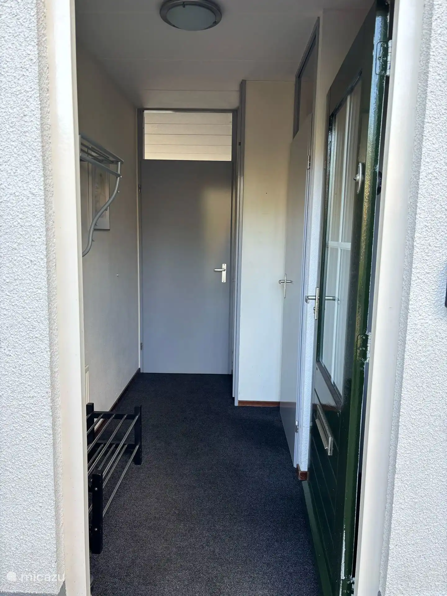 Hall with coat rack.