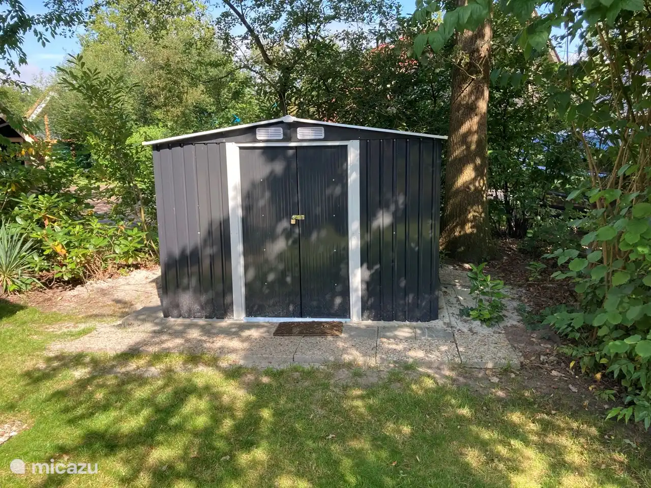 Shed for extra storage or for bicycles. The BBQ is also there.