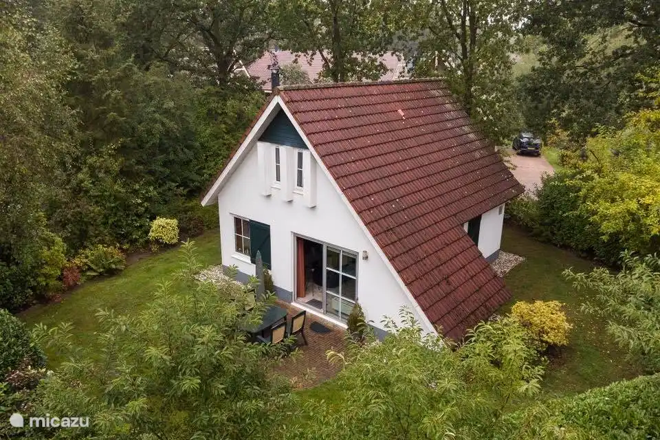 Our terrace is now over the entire length of the house. With a nice lounge set and a table with chairs so that you can also sit and/or eat outside,