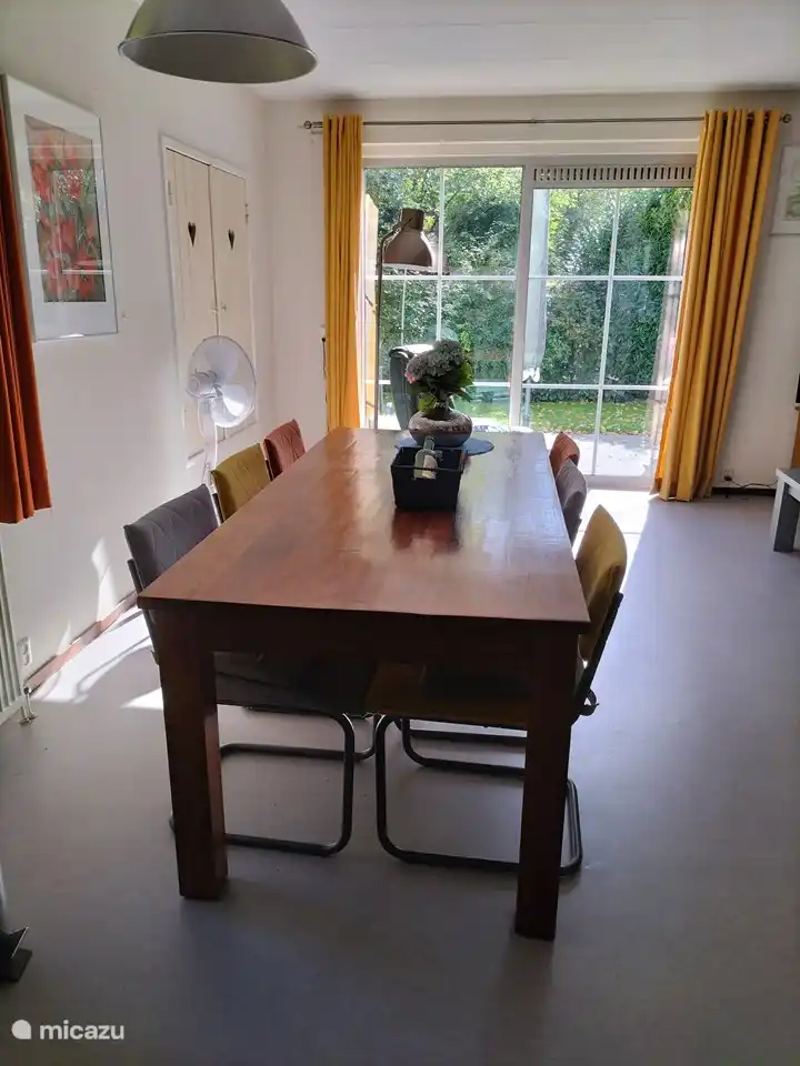 Our six-person table with fine chairs.