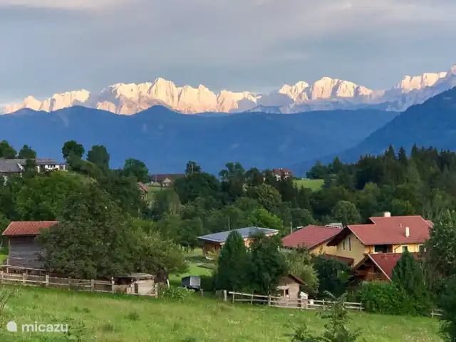 Haus Romsicht Karinthië huren in Oostenrijk, Karinthië, Kerschdorf/Nötsch - vakantiehuis Zonsondergang gericht op de Karawanken, Julische Alpen, Slovenië. Prachtige ruige bergen