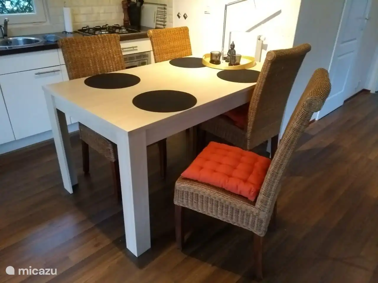 open kitchen with a cozy modern dining table