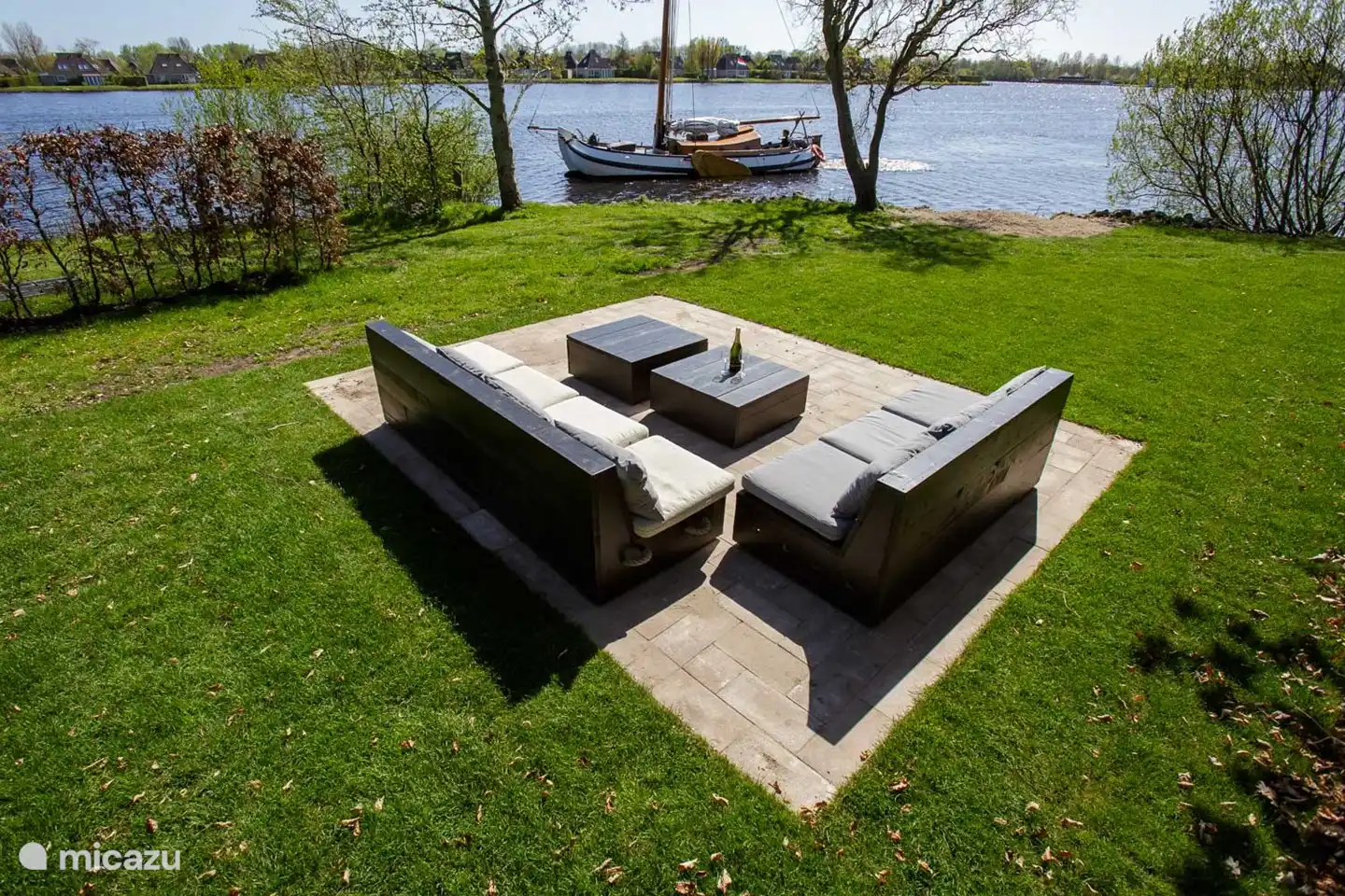 Seating on the water on the south with lots of privacy and a play beach.