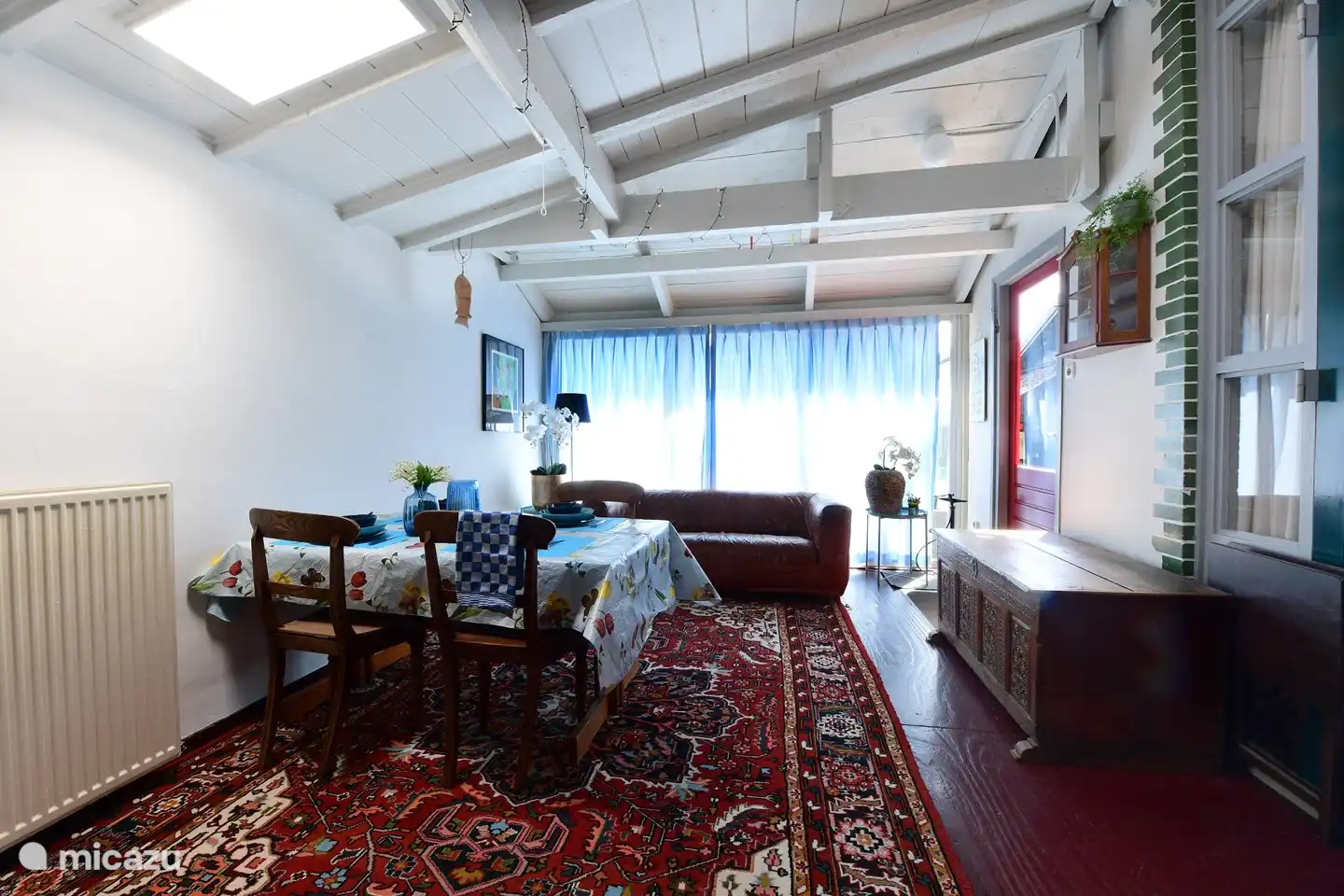 Conservatory with breakfast bar and seating area