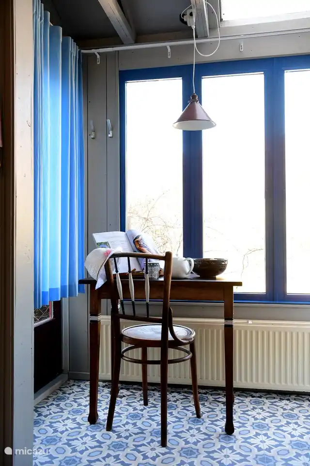Table in the kitchen with a view of the dunes