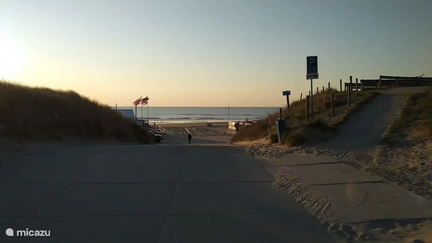 The wide beach of Wijk aan Zee with sunset