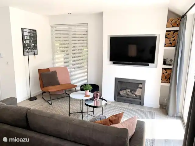 Liv Residence Casa de vacaciones y sauna en Países Bajos, Güeldres, Ermelo - casa vacacional El salón con TV con Netflix.