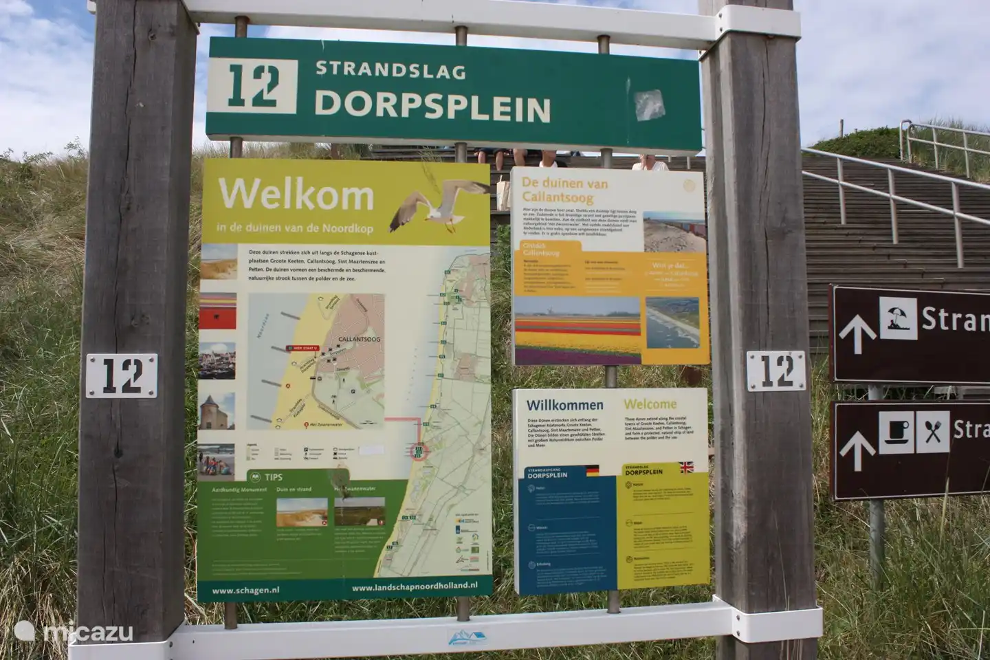 Information board about beach, sea and surroundings. Callantsoog receives the blue flag for clean seawater every year and has beach surveillance for the safety of bathers.