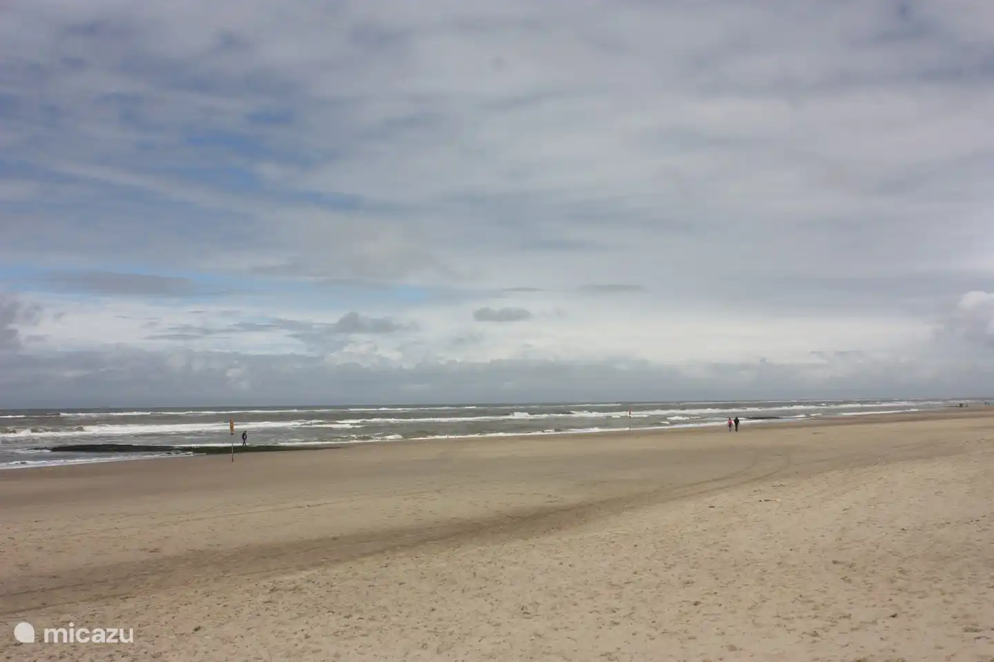 Wide, clean beaches and beautiful cloudy skies