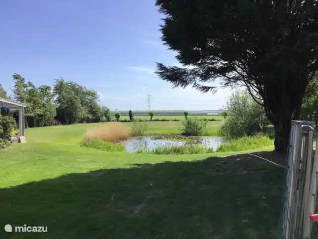 Chalet 'De Oude Gooten 2' | Pays-Bas, Hollande méridionale, Brielle - cabane en bois / lodge Vue depuis le jardin