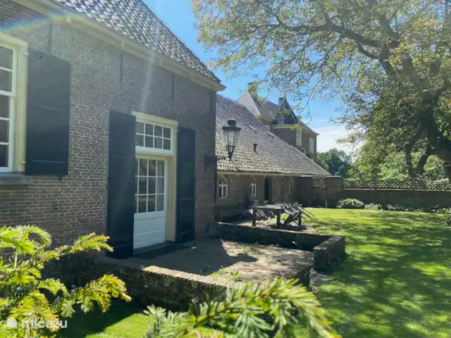 El establo de burros en Países Bajos, Güeldres, Lochem - casa vacacional Parte trasera de la casa de vacaciones