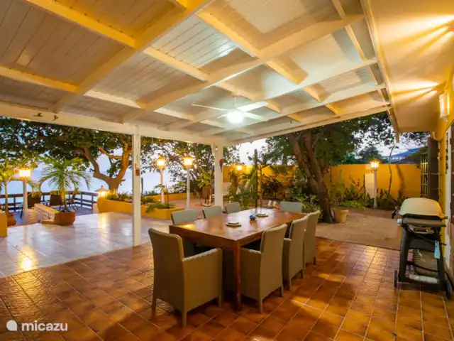 Villa Bord de mer | Curaçao, Curaçao-Centre, Sint Michiel - villa Porche pendant le coucher du soleil.