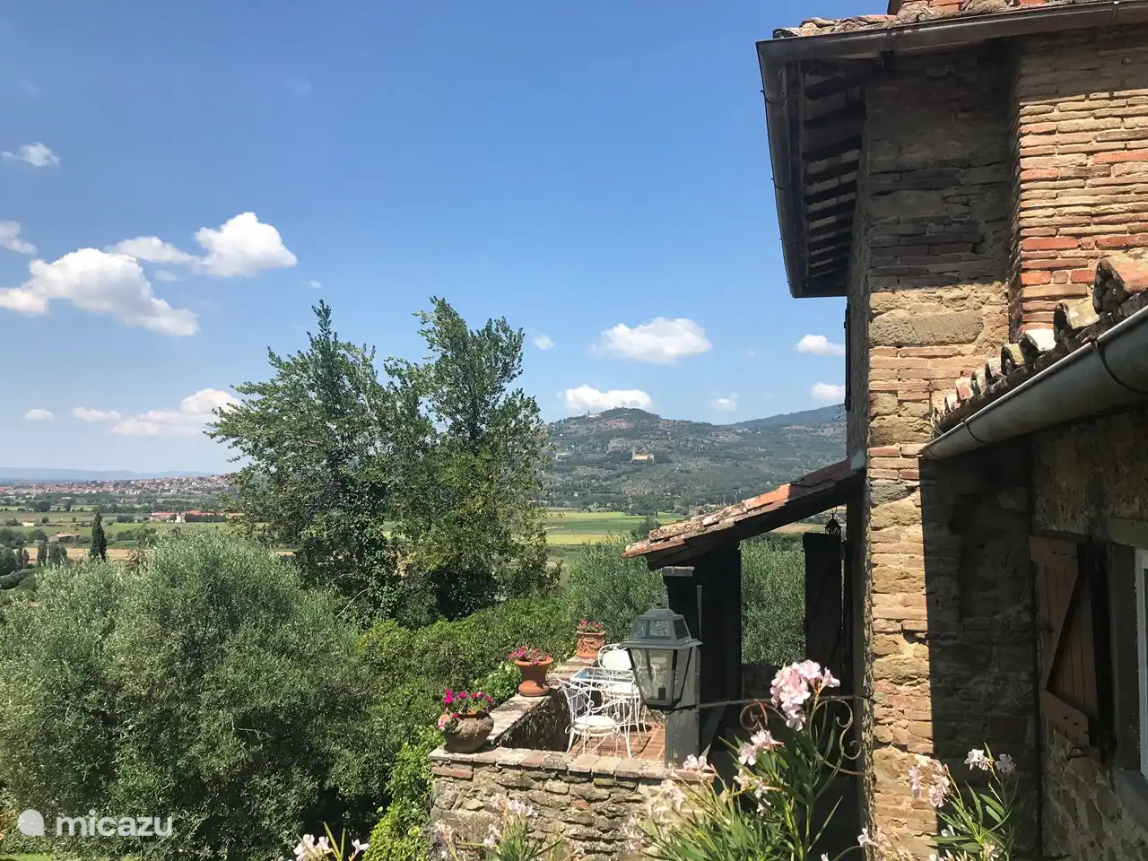 Het balkon met zitje