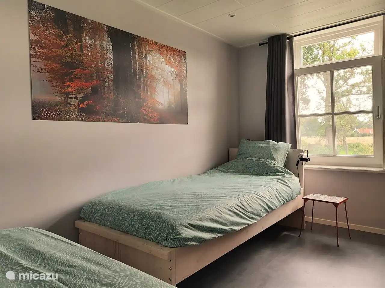 Al frente el dormitorio 'Tankenberg' con 2 camas individuales.