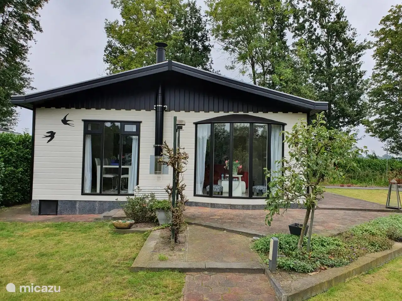 Notre maison de vacances De Zwaluw,
avec des portes coulissantes sur le jardin