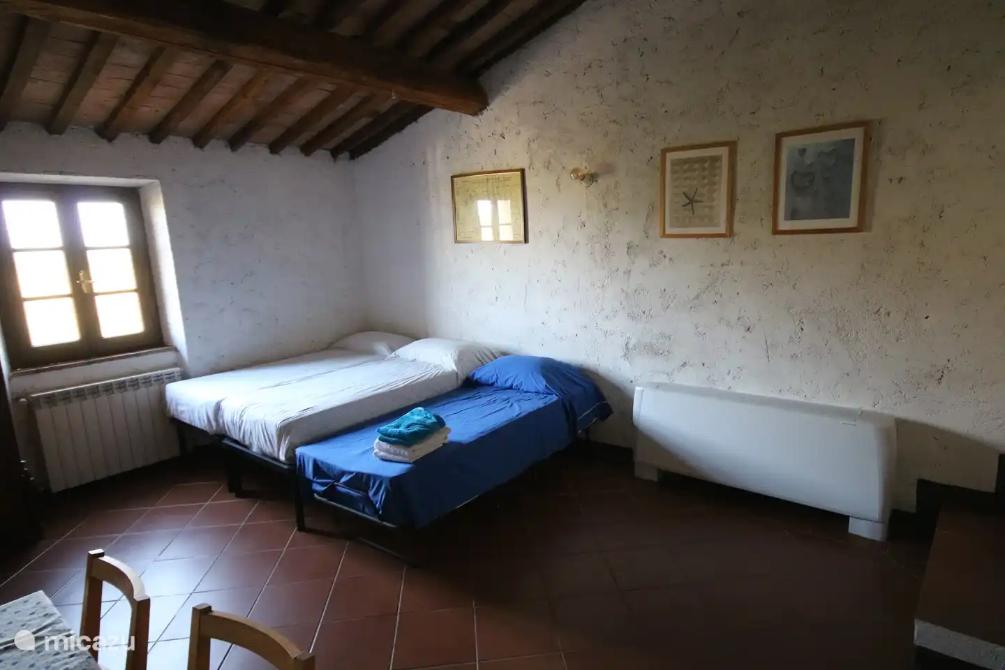 Slaapkamer 6 met 3 slaapplaatsen en airconditioning.