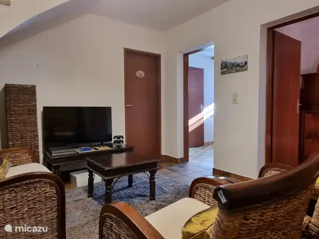 Chalet Stuhlfelden | Autriche, Salzburgerland, Stuhlfelden - chalet Coin salon dans le hall du sous-sol avec TV, PlayStation 4 et jeux
