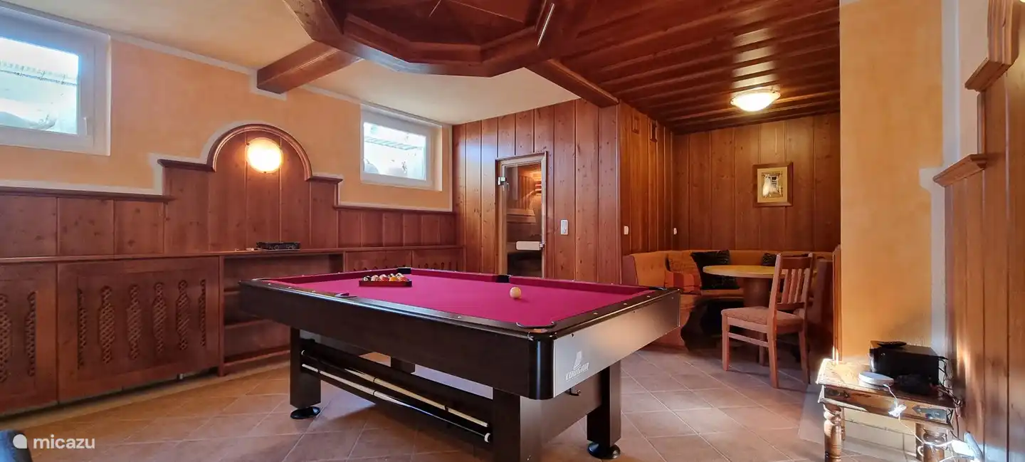 Recreation room with billiard table
