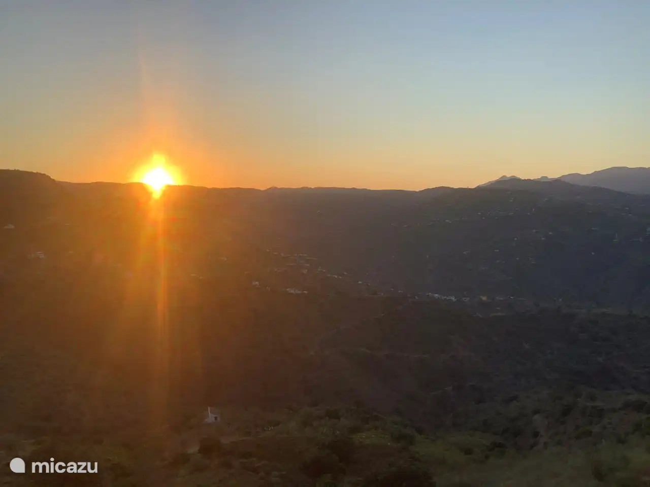 Zonsonderdag vanaf terras