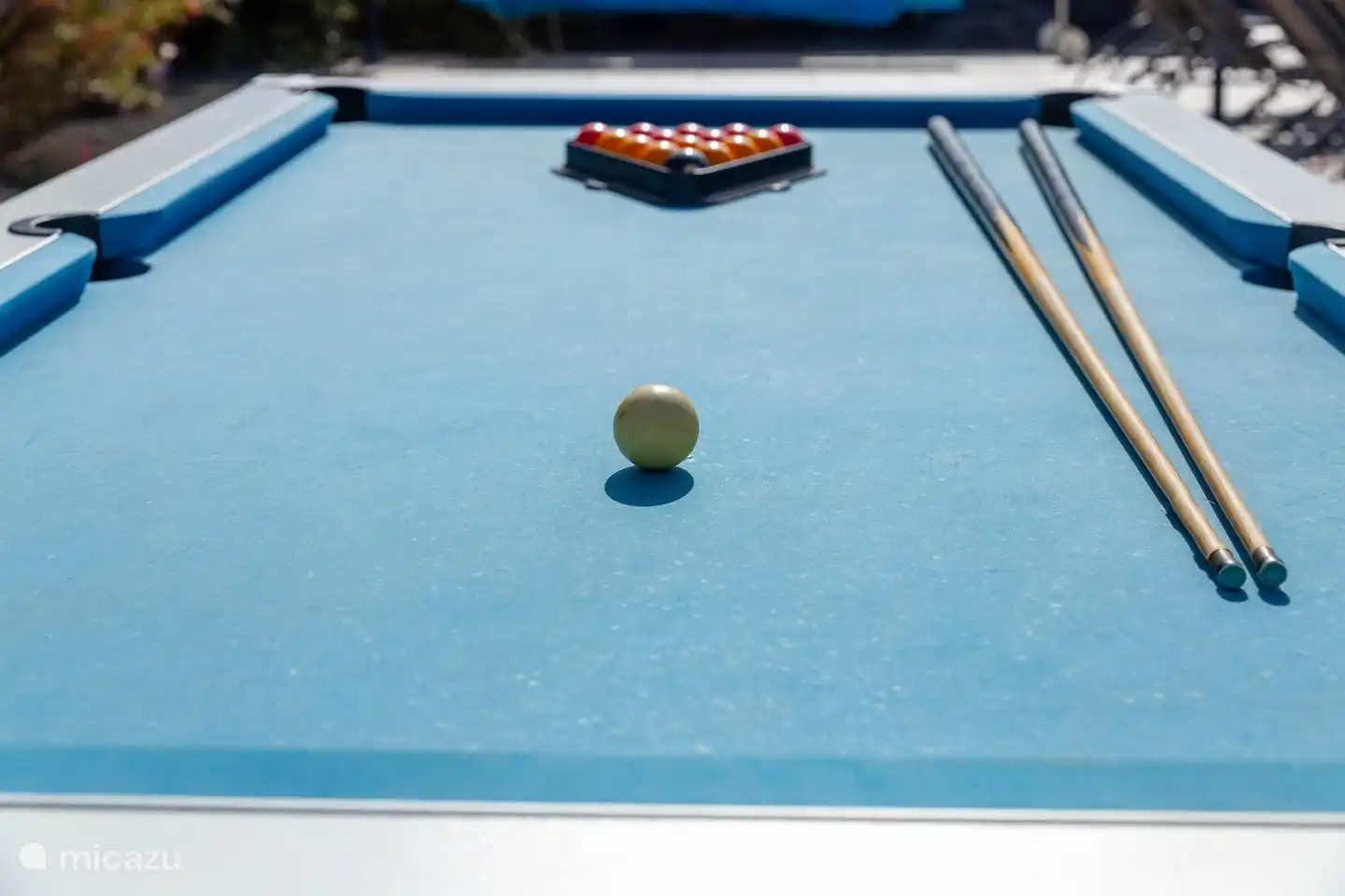 Playing a game of billiards is always fun.