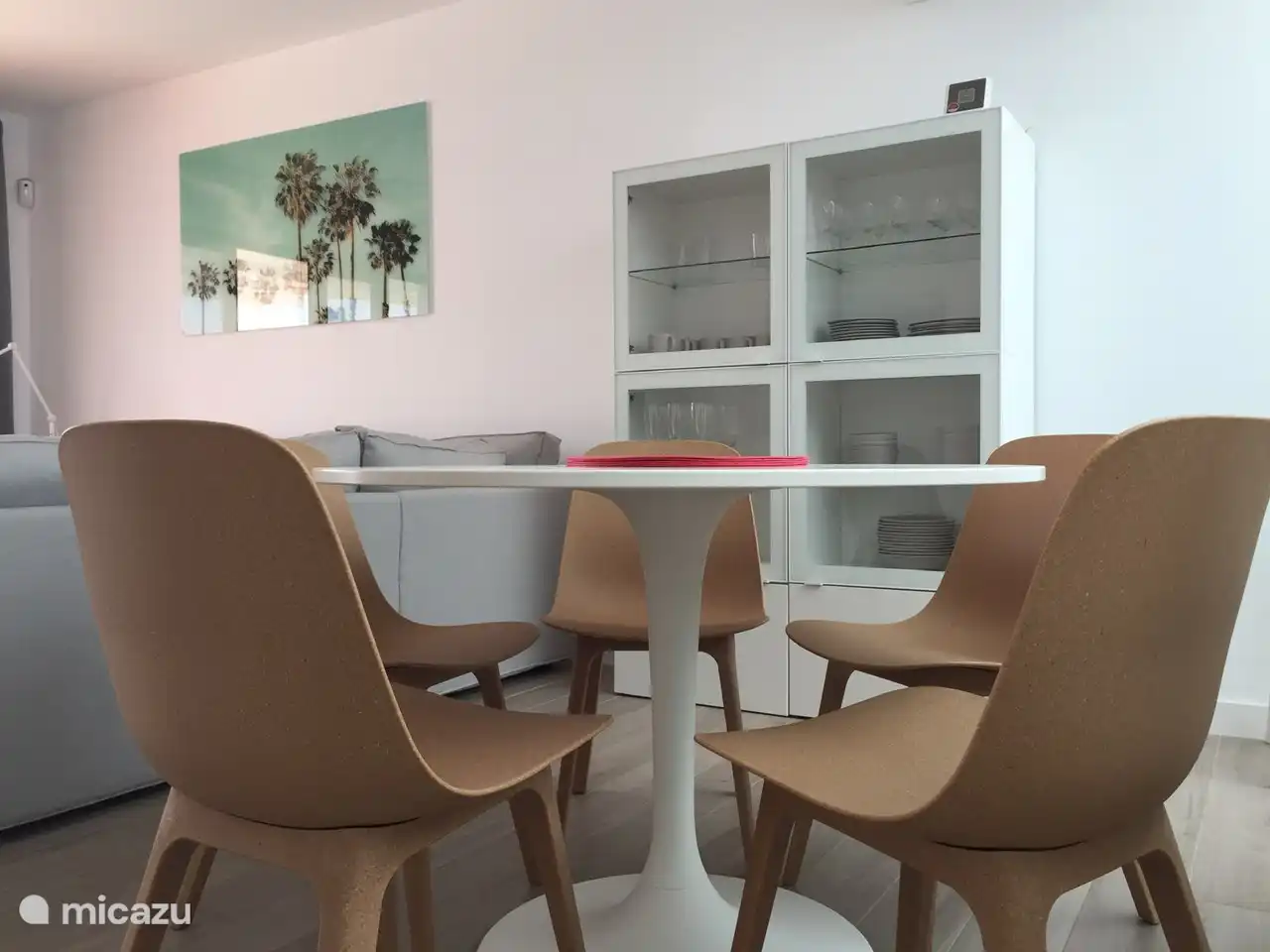 living. You can also eat inside if you want. But we have to admit that we have rarely done this until now. You can also work there on your laptop, … . You will also find food and glassware there.