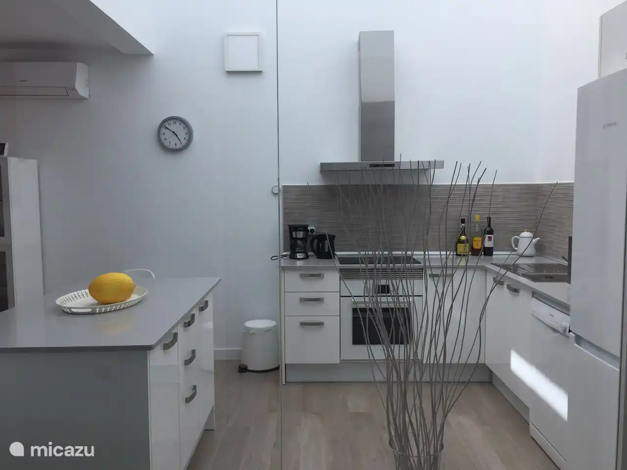 Bright modern fitted kitchen. The current appliances and kitchen utensils are available.