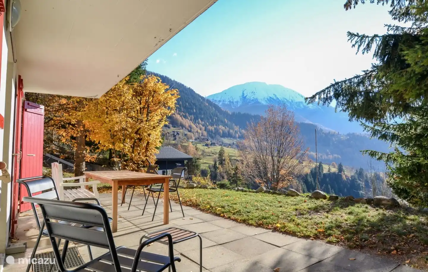 The view from the terrace. Here you look at the Rhone Valley and the town of Ernen.