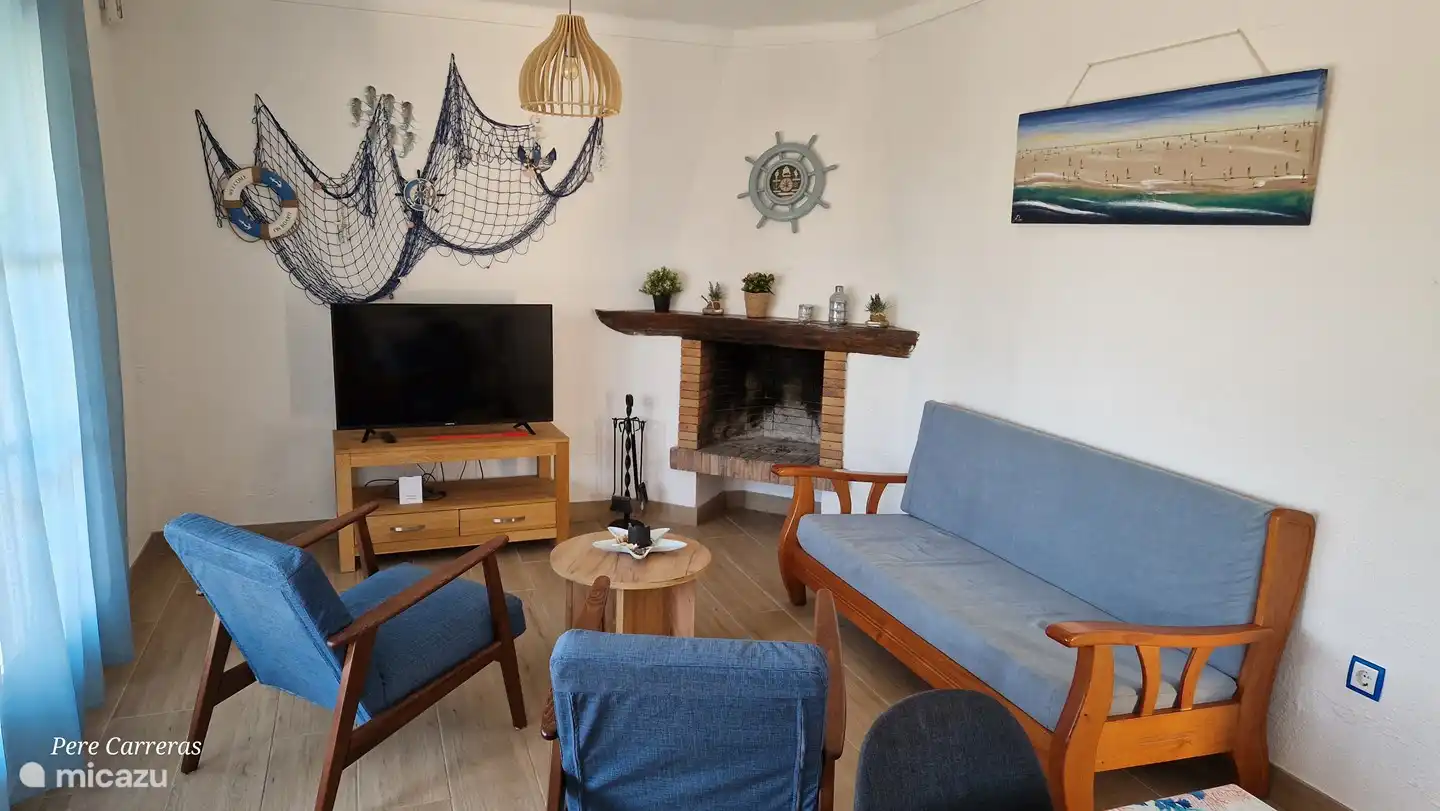 Living room with sofa and armchair