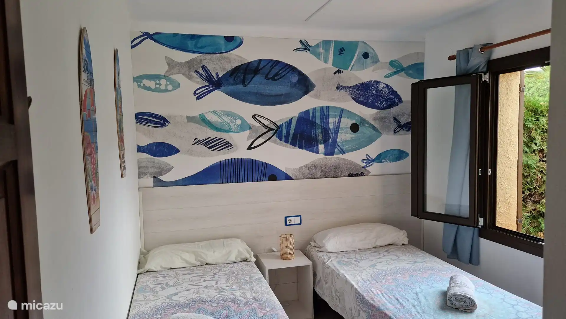 Room with two single beds