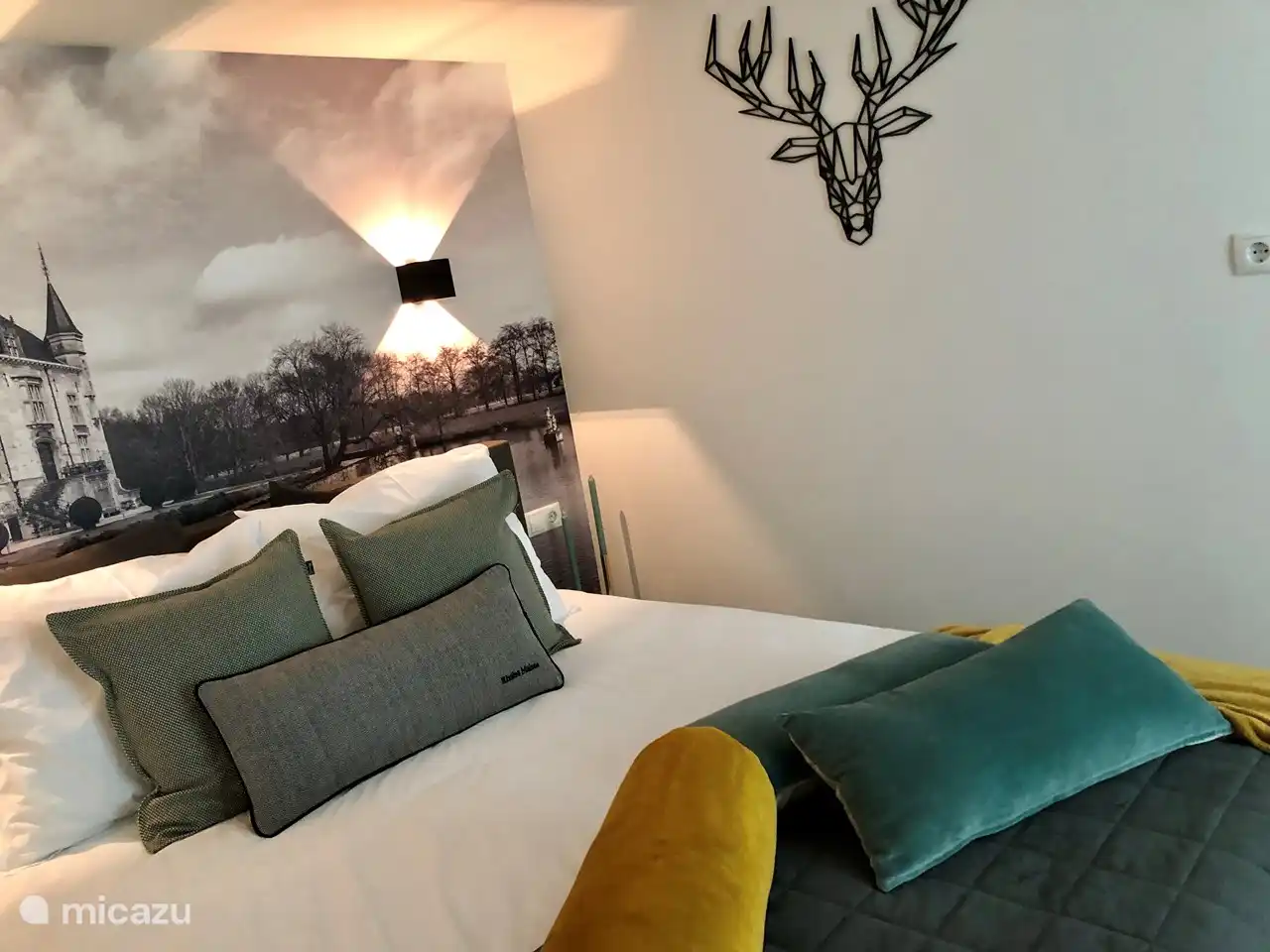 The box spring is 160 cm wide and 210 cm long